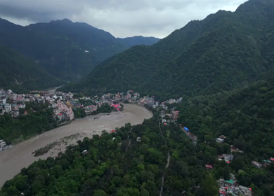 Aerial shot of Bajrang Setu suspension bridge over Ganges River in Rishikesh India