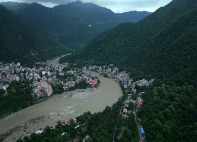 Aerial shot of Bajrang Setu suspension bridge over Ganges River in Rishikesh India