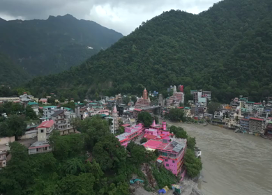 Aerial shot of Bajrang Setu suspension bridge over Ganges River in Rishikesh India