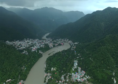 Aerial shot of Ganges River flowing through Rishikesh India