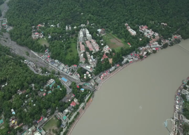 Aerial shot of Ganges River flowing through Rishikesh India