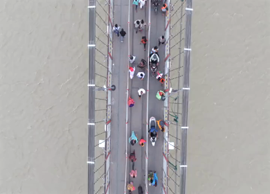 Aerial shot of Janki Setu suspension bridge over Ganges River in Rishikesh India
