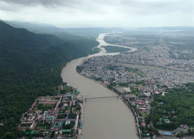 Aerial shot of Janki Setu suspension bridge over Ganges River in Rishikesh India