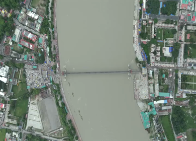 Aerial shot of Janki Setu suspension bridge over Ganges River in Rishikesh India