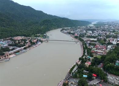 Aerial shot of Janki Setu suspension bridge over Ganges River in Rishikesh India