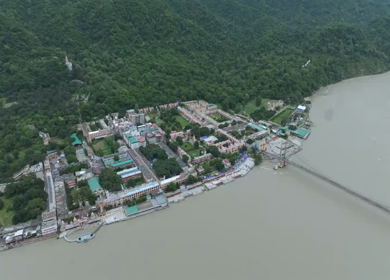 Aerial shot of Janki Setu suspension bridge over Ganges River in Rishikesh India