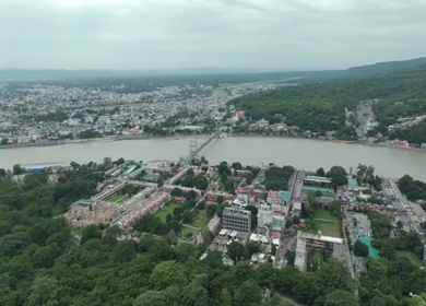 Aerial shot of Janki Setu suspension bridge over Ganges River in Rishikesh India