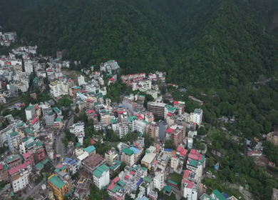 Aerial drone shot of Rishikesh hillside town in Uttarakhand India
