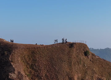 Aerial shot of Tourists Watching Sea of Clouds at Nongjrong Viewpoint Meghalaya
