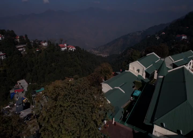 Aerial shot of an Indian couple during a pre-wedding shoot in the hills of Mussoorie, Uttarakhand