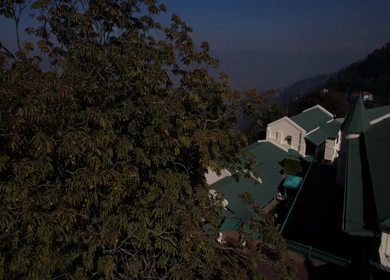 Aerial shot of an Indian couple during a pre-wedding shoot in the hills of Mussoorie, Uttarakhand
