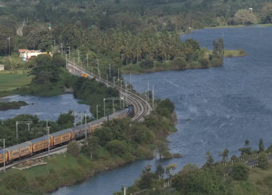 Aerial shot of train running at Maravanthe near Kundapura Karnataka India