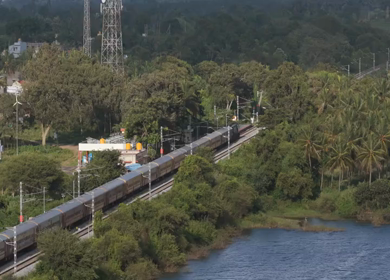 Aerial shot of train running at Maravanthe near Kundapura Karnataka India