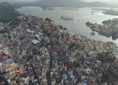 Aerial view of City Palace and Lake Pichola in Udaipur Rajasthan India