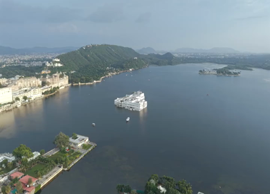 Aerial view of City Palace and Lake Pichola in Udaipur Rajasthan India