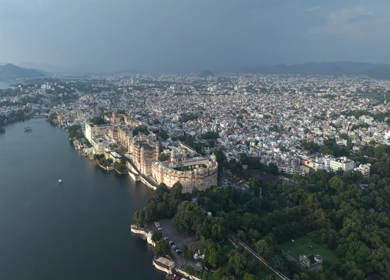 Aerial view of City Palace and Lake Pichola in Udaipur Rajasthan India