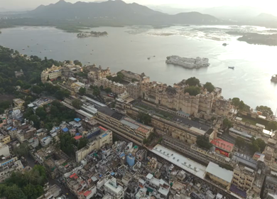 Aerial view of City Palace and Lake Pichola in Udaipur Rajasthan India