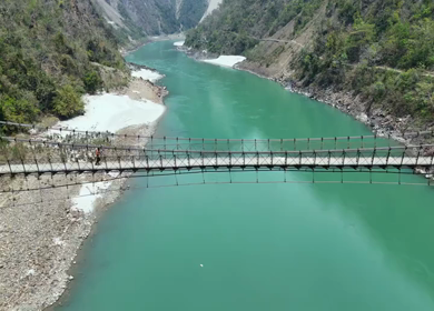 Aerial view of Kaudiyala hanging bridge over Ganga river near Rishikesh India
