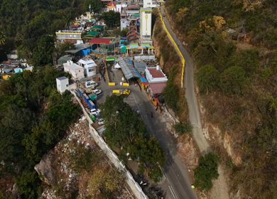 Aerial view of Marudhamalai Temple and winding hill roads in Coimbatore Tamil Nadu