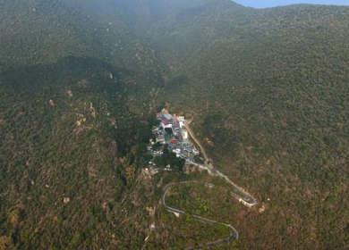 Aerial view of Marudhamalai Temple and winding hill roads in Coimbatore Tamil Nadu