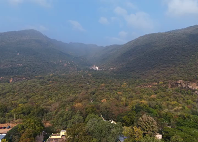 Aerial view of Marudhamalai Temple and winding hill roads in Coimbatore Tamil Nadu