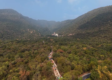 Aerial view of Marudhamalai Temple and winding hill roads in Coimbatore Tamil Nadu