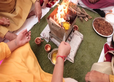 New Delhi, NCR,India- 9th February, 2020: Slow Motion shot of Fire,Agni havan kund,Indian Havan Kund, rituals of hindus yagya at an Indian Wedding Function in New Delhi,India
