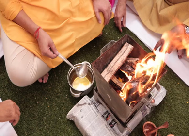 New Delhi, NCR,India- 9th February, 2020: Slow Motion shot of Fire,Agni havan kund,Indian Havan Kund, rituals of hindus yagya at an Indian Wedding Function in New Delhi,India