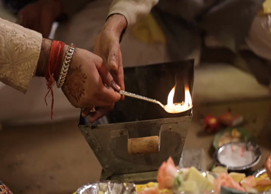 Slow Motion shot of Fire,Agni havan kund,Indian Havan Kund, rituals of hindus yagya at an Indian Wedding Function in New Delhi,India