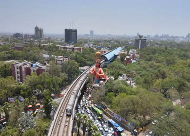 An Aerial Shot of Hanuman statue and Delhi Metro at Jhandewalah, New Delhi,India