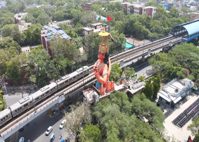 An Aerial Shot of Hanuman statue and Delhi Metro at Jhandewalah, New Delhi,India