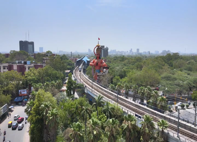 An Aerial Shot of Hanuman statue and Delhi Metro at Jhandewalah, New Delhi,India