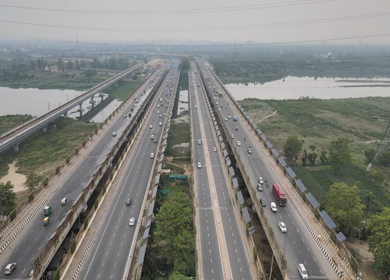 An aerial drone shot of the National Highway 24 in NCR, India