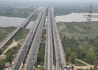 An aerial drone shot of the National Highway 24 in NCR, India
