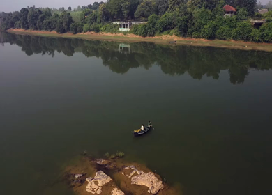 An Aerial Shot of a tourist enjoying boat ride in Tendu Leaf Jungle Resort in Madhya Pradesh