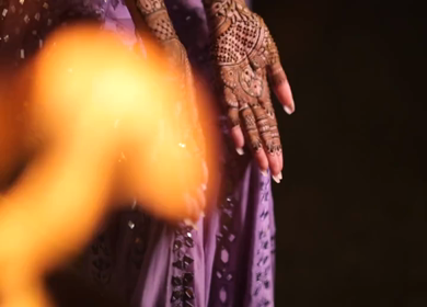 A Shot of Indian Bride showing Mehndi in her Hands at her Indian Wedding in New Delhi, India