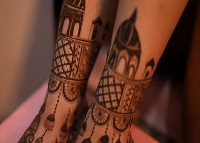 A Shot of Indian Bride showing Mehndi on her feet at her Indian Wedding in New Delhi, India