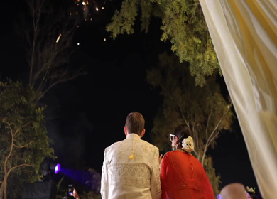 5th January 2025 : A Slow motion shot of a Indian Groom and Indian Bride posing towards camera at their Indian wedding in India