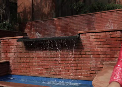 A Slow motion shot of a Indian Groom and Indian Bride posing towards camera at their Indian wedding in India