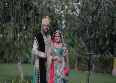 A Slow motion shot of an Indian Groom and Indian Bride posing towards camera at their Indian wedding in India