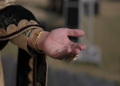 A Slow motion shot of an Indian Groom and Indian Bride posing towards camera at their Indian wedding in India