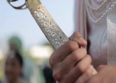 A shot of an Indian Groom posing for the photoshoot at his Indian Wedding