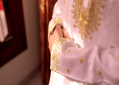 A shot of an Indian Groom posing for the photoshoot at his Indian Wedding