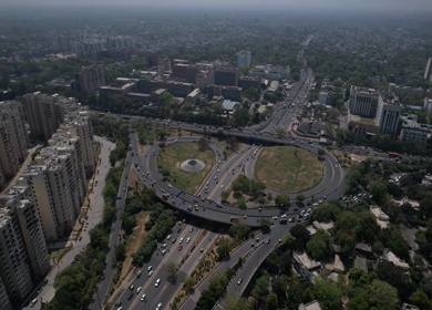 An aerial shot of the flyover with running traffic in New Delhi, India
