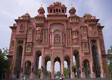A shot of the iconic Patrika Gate showcasing vibrant pink architecture in Jaipur, India