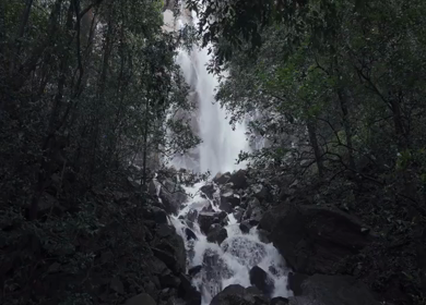 Drone shot of a person tourist Near Waterfall in Karnataka India