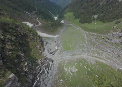 FPV Aerial View of Mountain Valley and Snow Patch in Ladakh, India