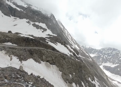 FPV Aerial View of Mountain Valley and Snow Patch in Ladakh, India