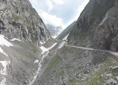 FPV Aerial View of Mountain Valley and Snow Patch in Ladakh, India