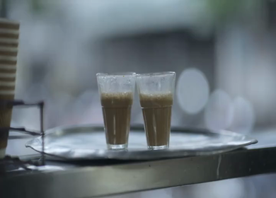 Freshly Served Hot Masala Chai in Glass Cups at Indian Tea Stall